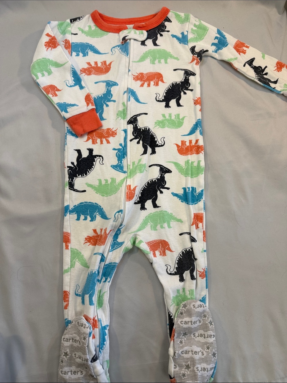 Carter's White Footed One-Piece with Multi-Color Dinosaur Print and Orange Trim